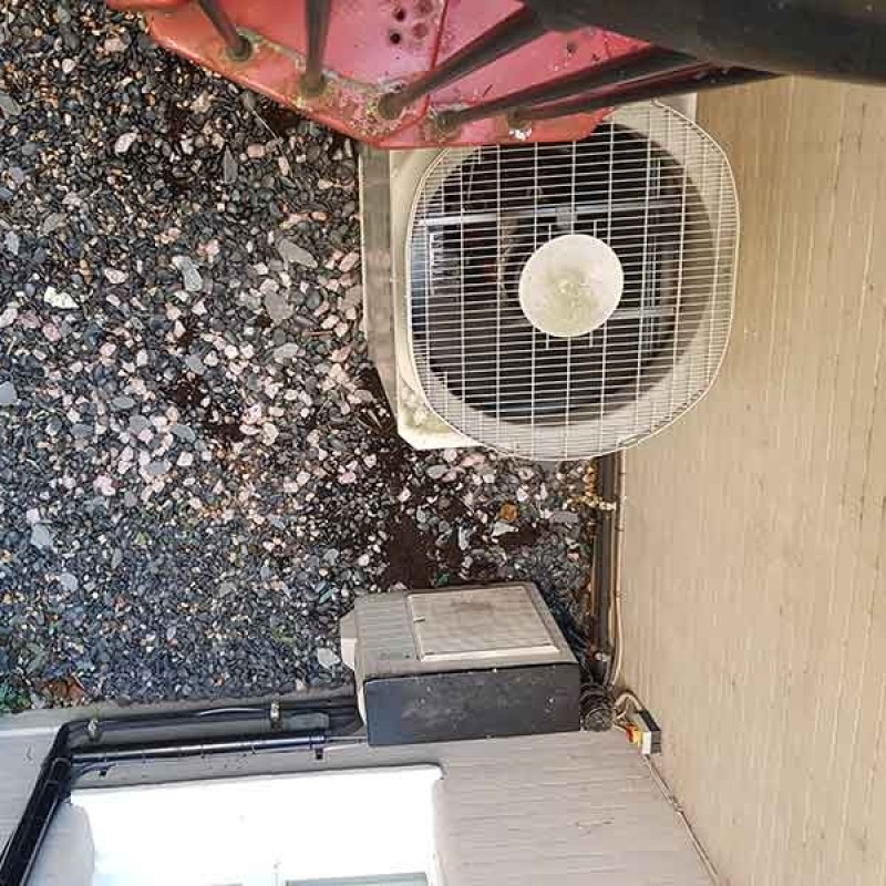 Installation of two external air condenser units and repositioning of existing